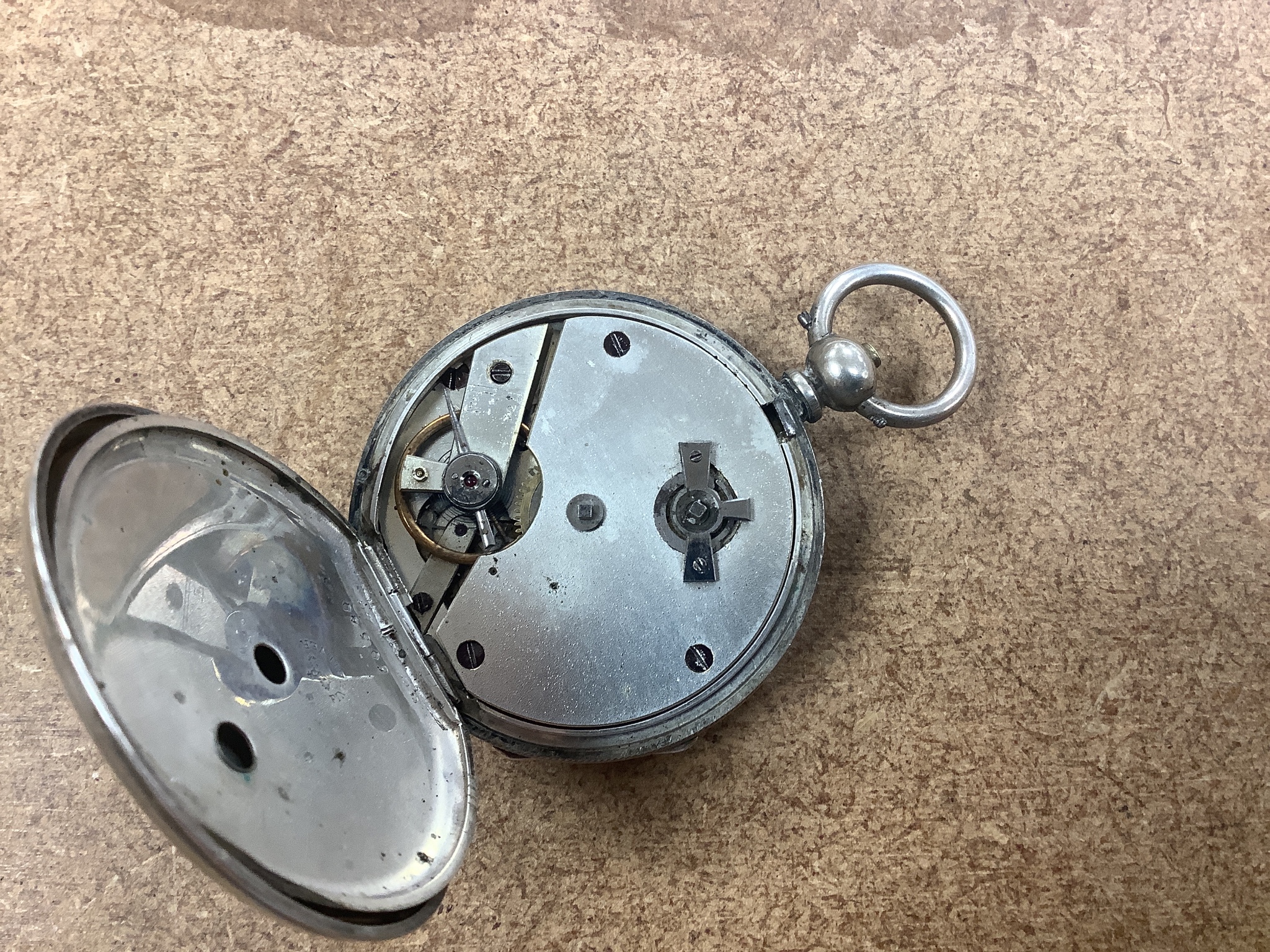 Sundry watches and jewellery including a white metal open face pocket watch and fob watch, three lady's wrist watches including one 9ct gold cased, three costume rings, a bangle, assorted watch keys and a lady's enamelle